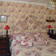 Yes, that is the same pattern on the everything. Also the drapes, outlet and switch covers. The door to the left is to the Kill Room. No sane person would do this.